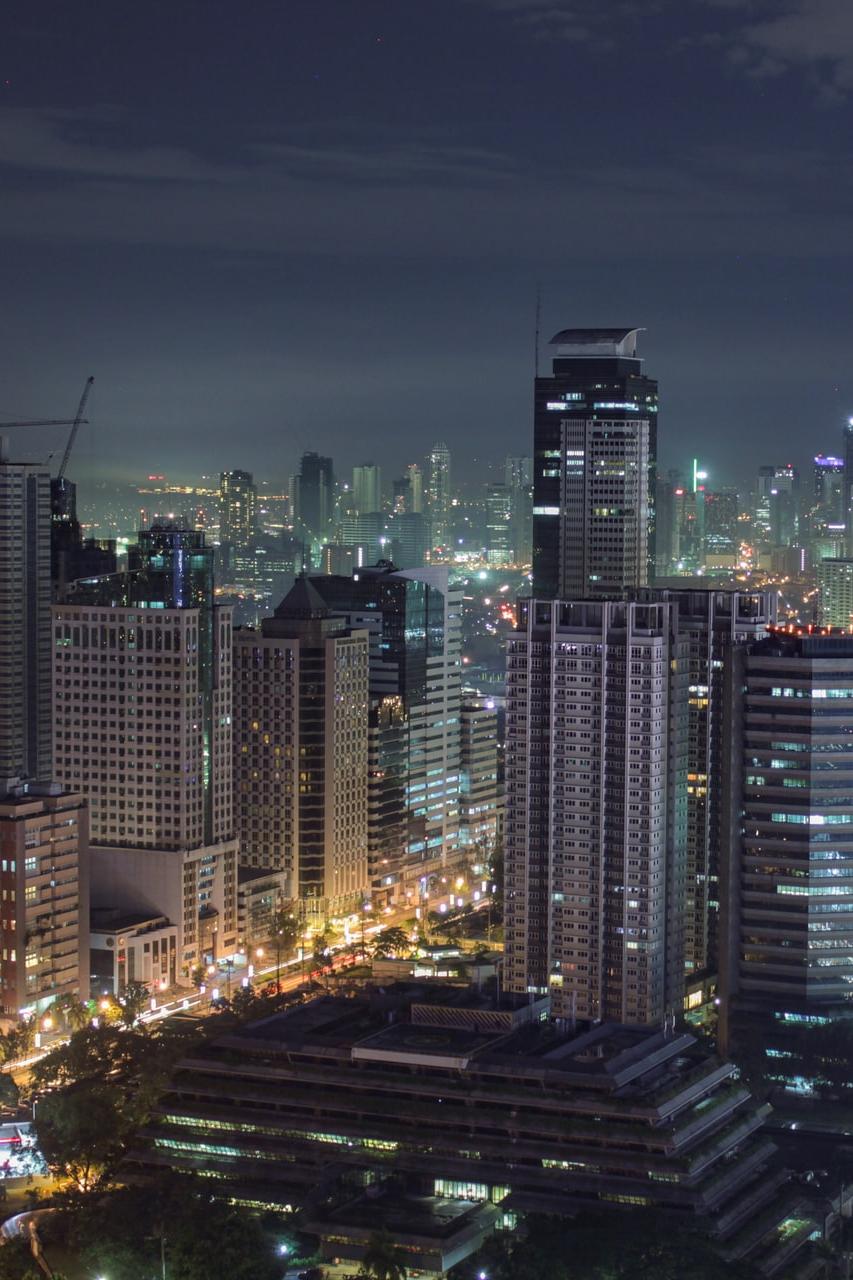 city skyline during night time